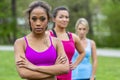 Three Young College Students Enjoying Each Others Company Before Working Out Royalty Free Stock Photo