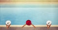 Three Young females in hats in the pool Royalty Free Stock Photo