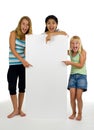 Three young females with white board