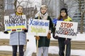 Montreal, Canada Ã¢â¬â February 27 2022: Three young girls hold protest signs to protest Russian aggression in the Ukraine