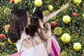 Three young girls holds shopping bags Royalty Free Stock Photo