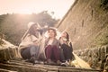 Three young girls sitting on the stairs. Royalty Free Stock Photo