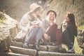 Three young girls sitting on the stairs. Royalty Free Stock Photo