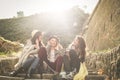 Three young girls sitting on the stairs at the public park. Three young girls sitting on the stairs at the public park an having Royalty Free Stock Photo