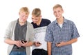 Three young guys use smartphones