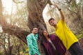 Three young people make selfi under the olive tree Royalty Free Stock Photo