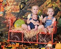 Three Young Siblings in the Fall Royalty Free Stock Photo