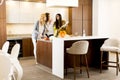 Three young woman in the kitchen Royalty Free Stock Photo