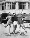 Three young women playing with a ball on the beach Royalty Free Stock Photo