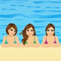 Three young women in swimming pool Royalty Free Stock Photo