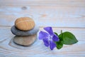 Three zen stones with old wood background