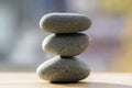 Three zen stones pile, grey meditation pebbles tower