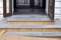 Threshold with granite steps of a brick house.