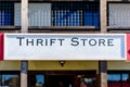 Thrift Store sign with classic typography above wooden storefront Royalty Free Stock Photo