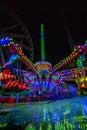 THRILL RIDES WITH COLORFUL LIGHTS Royalty Free Stock Photo