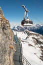 The Thrill Walk at Birg in the Swiss Alps. The steel structure is built into the cliff side and there is a vertical drop beneath.