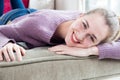 Thrilled beautiful caucasian girl leaning her head for home happiness Royalty Free Stock Photo