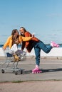 thrilled woman riding rollers skates near