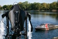 Thriller seeker`s jet pack for jet lev or jet levitation waits by the lakeside.