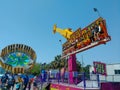 Thrilling Carnival Rides on a Beautiful Day