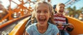 Thrilling Rollercoaster Ride Creates Joyful Summer Memories For A Happy Mother And Her Children
