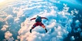 A thrilling skydiver leaps from a plane into the vast blue sky. The clouds create a soft bed below, inviting adventure Royalty Free Stock Photo