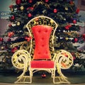 Throne for Santa Claus under the Christmas tree. Christmas background. Beautiful decoration for the winter holidays and the Advent Royalty Free Stock Photo