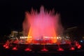 Throngs of people at the colourful light & water fountain show. Night in Barcelona, Spain, at the magic fountain. Royalty Free Stock Photo