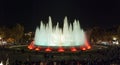 Throngs of people at the colourful light & water fountain show. Night in Barcelona, Spain, at the magic fountain. Royalty Free Stock Photo