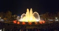 Throngs of people at the colourful light & water fountain show. Night in Barcelona, Spain, at the magic fountain. Royalty Free Stock Photo