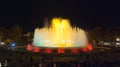 Throngs of people at the colourful light & water fountain show. Night in Barcelona, Spain, at the magic fountain. Royalty Free Stock Photo