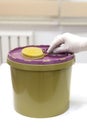 Throw away the medicine in the trash. Disposal container for Infectious waste, reducing medical waste disposal. Small Medical Royalty Free Stock Photo