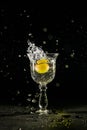 Throw grapes in a water-filled glass splash