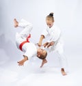 Throw Judo makes sportswoman with white belt Royalty Free Stock Photo