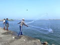 Throwing the cast-net for catching the fish