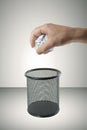 Throwing crumpled paper in the trash Royalty Free Stock Photo