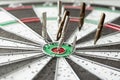 throwing dip pen nibs in a dartboard, macro, Royalty Free Stock Photo