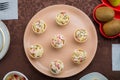 Throwing forks on the table set with salad in tartlets, fruit snacks Royalty Free Stock Photo