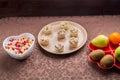 Throwing forks on the table set with salad in tartlets, fruit snacks Royalty Free Stock Photo