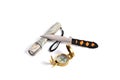 Throwing knife camouflage flashlight and compass on a white background