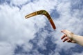 Throwing painted boomerang, midair Royalty Free Stock Photo