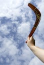 Throwing painted boomerang, vertical Royalty Free Stock Photo