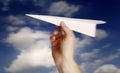 Throwing a paper plane.. Royalty Free Stock Photo