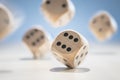 Throwing and rolling wooden dice on a blue background Royalty Free Stock Photo