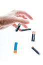 Throwing used batteries Royalty Free Stock Photo