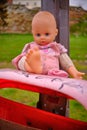 Thrown out baby doll toy Royalty Free Stock Photo