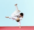Throws judo two athletes are training on the mat Royalty Free Stock Photo