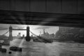 Black and White Picture of Hms Belfast and Tower Bridge during Sunset.