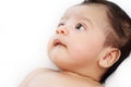 ThThe cute baby boy is happy relax closeup on the white bed. Royalty Free Stock Photo