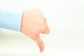 Thumb down finger on light background Royalty Free Stock Photo